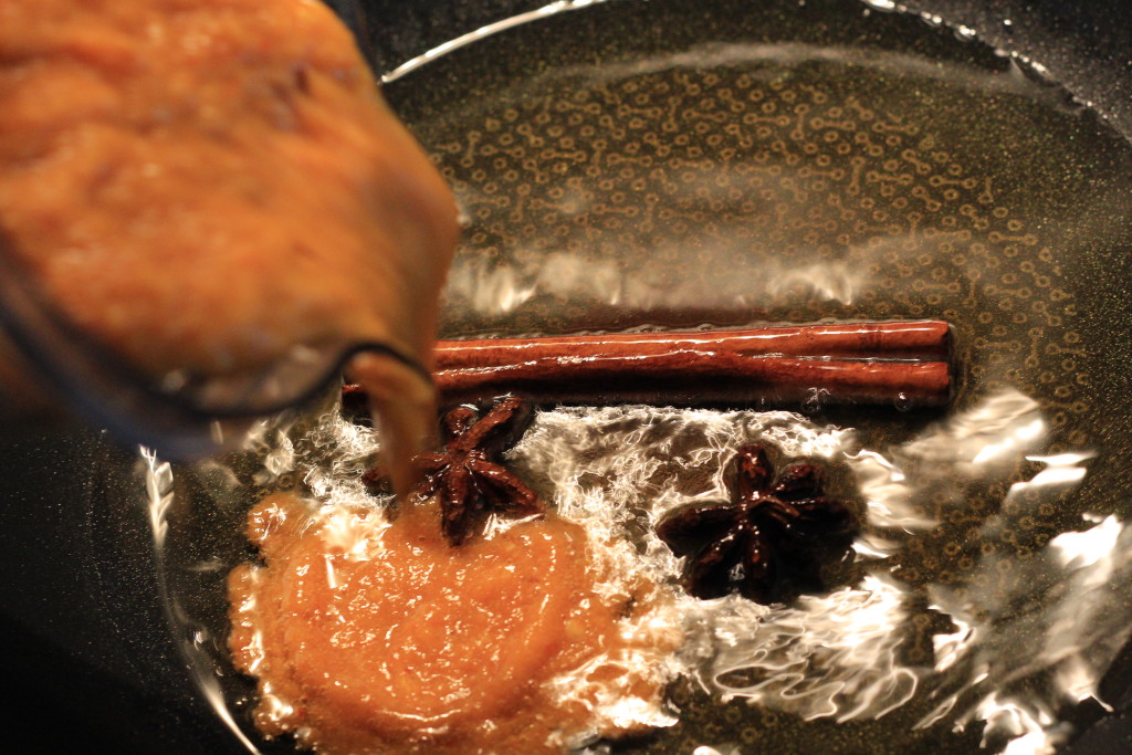 Pouring in the blended ingredients